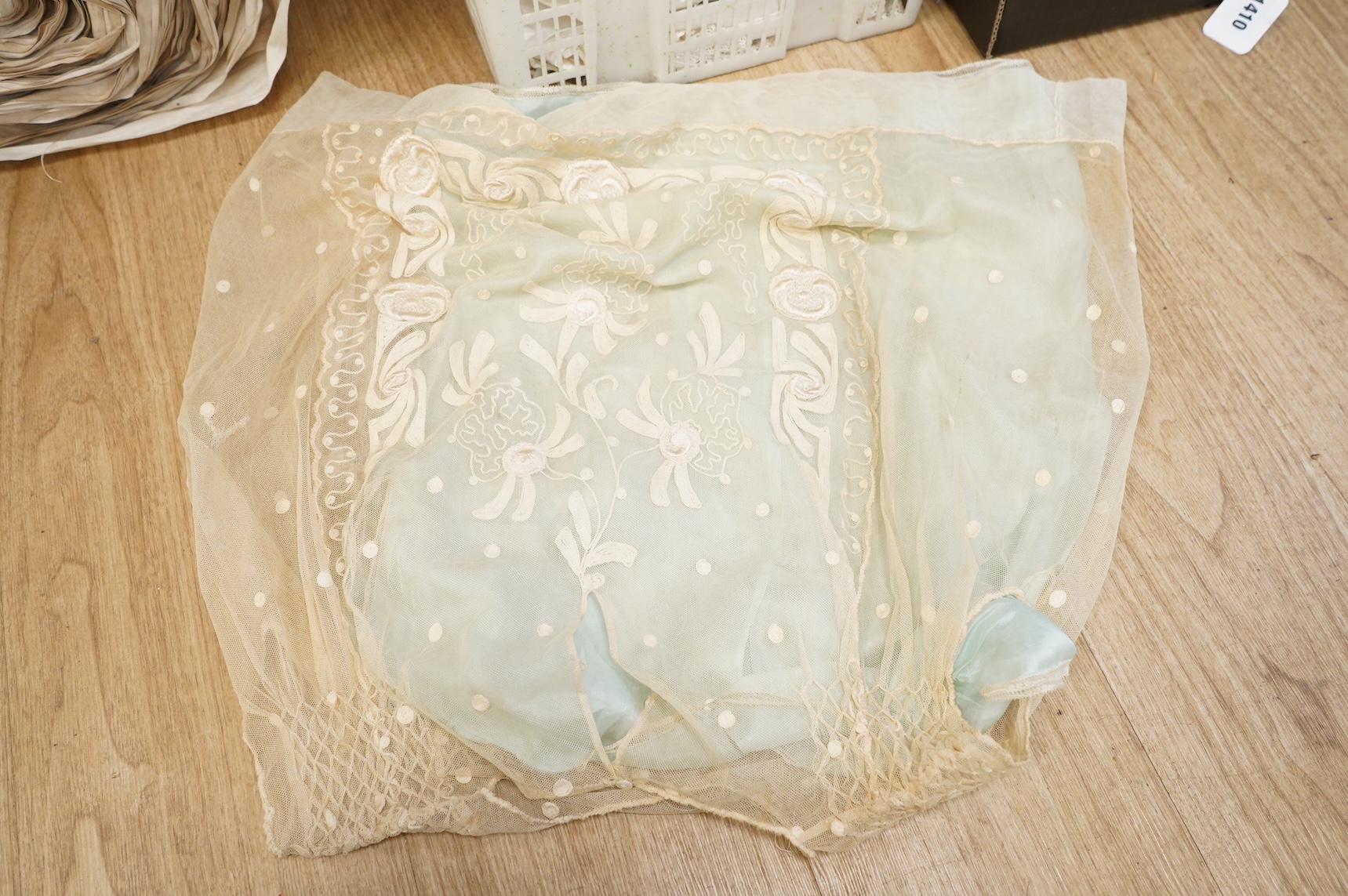 A collection of French mixed chemise and under garments and lace child’s dress